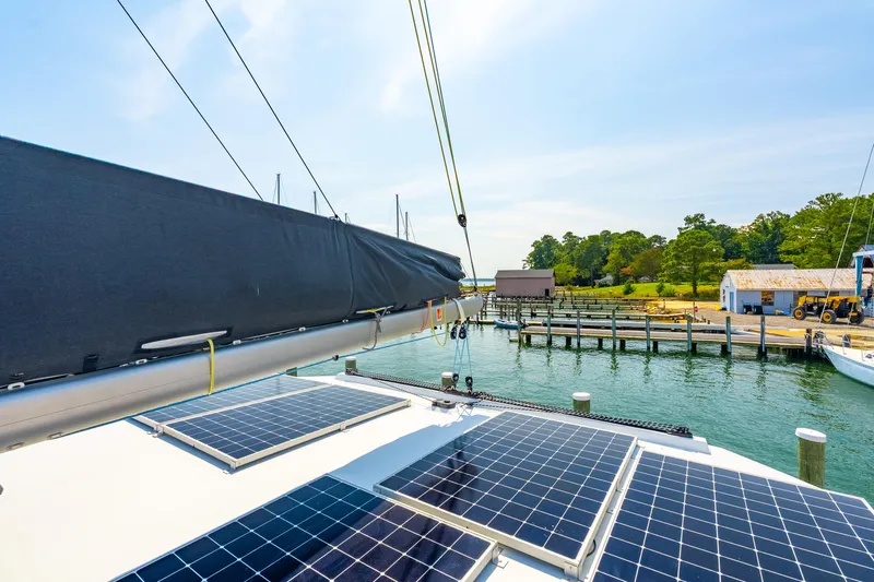 Carolina Red Yacht Photos Pics 2024 St Francis 460 yacht with solar panels docked at a marina.
