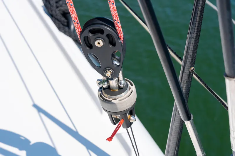 Carolina Red Yacht Photos Pics Close-up of a 2024 St Francis 460 sailboat rigging pulley system.