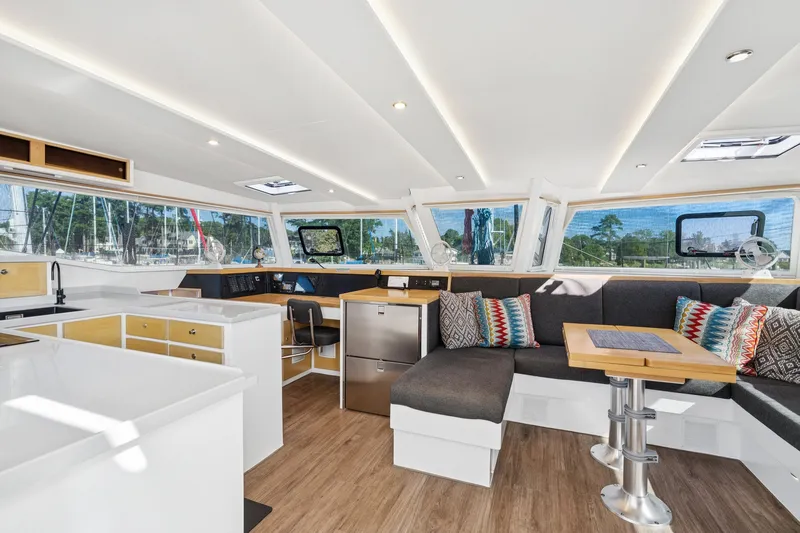 Carolina Red Yacht Photos Pics Luxurious interior of 2024 St Francis 460 yacht with modern kitchen and seating area.