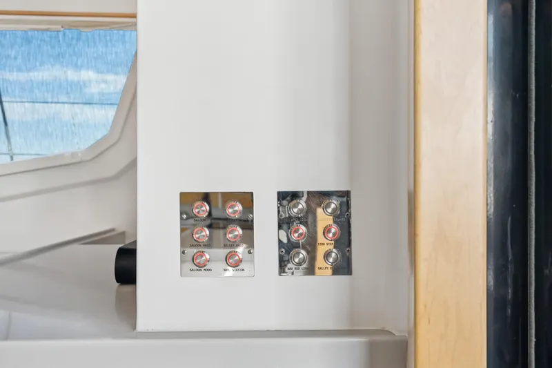 Carolina Red Yacht Photos Pics Control panel on 2024 St Francis 460 yacht, featuring labeled switches and modern design.