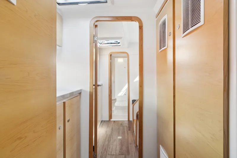 Carolina Red Yacht Photos Pics 2024 St Francis 460 interior, featuring sleek wooden cabinetry and modern design elements.