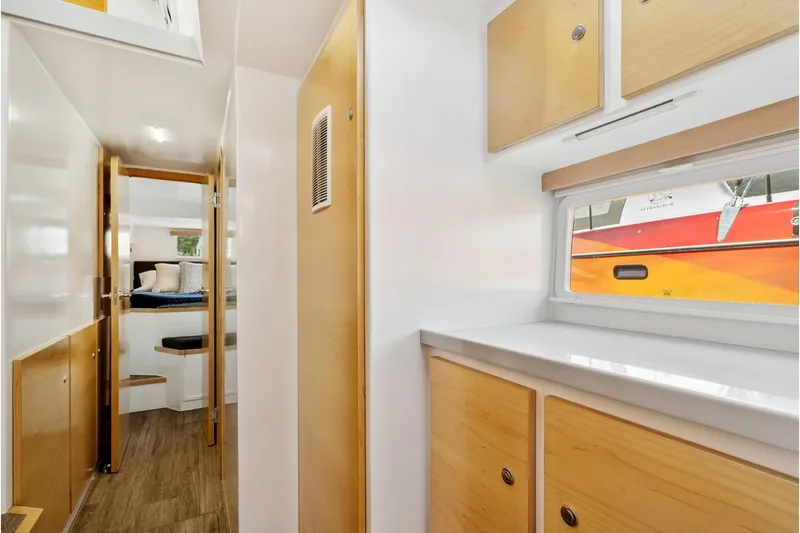 Carolina Red Yacht Photos Pics Interior of 2024 St Francis 460 yacht, featuring modern wood cabinetry and sleek design.