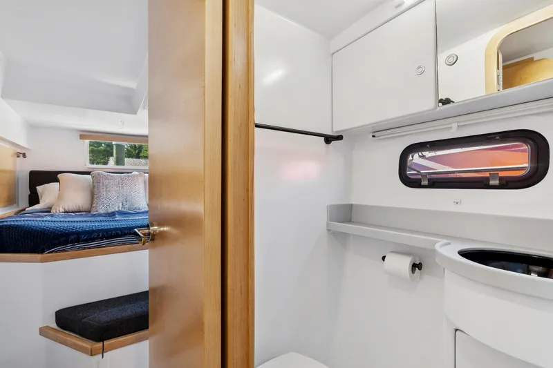 Carolina Red Yacht Photos Pics 2024 St Francis 460 interior with cozy bedroom and modern bathroom.