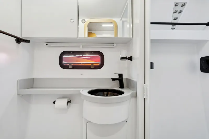 Carolina Red Yacht Photos Pics Modern bathroom interior of 2024 St Francis 460 yacht with sleek fixtures and compact design.