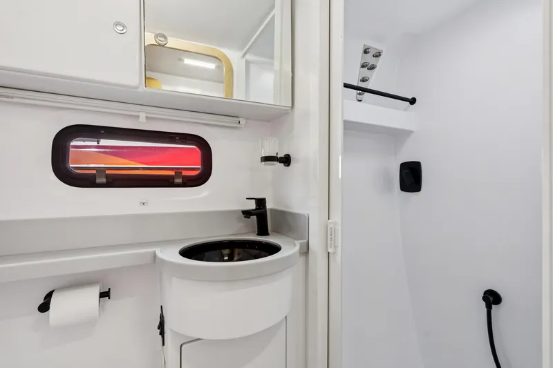 Carolina Red Yacht Photos Pics Modern bathroom in 2024 St Francis 460 yacht with sleek fixtures and compact design.