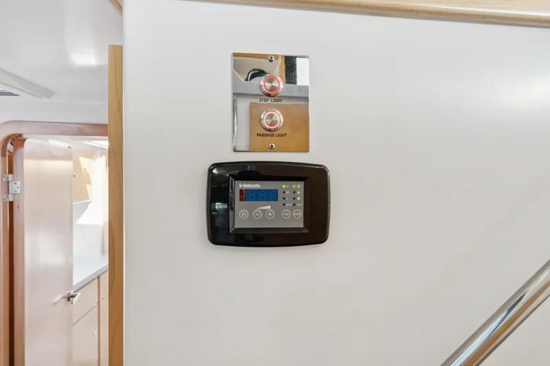 Carolina Red Yacht Photos Pics Control panel and light switches inside 2024 St Francis 460 yacht interior.