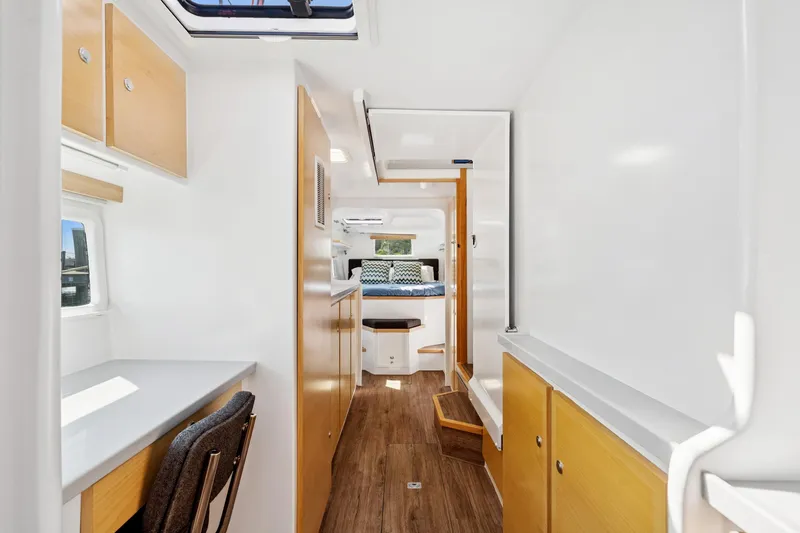 Carolina Red Yacht Photos Pics 2024 St Francis 460 interior with modern design, wooden accents, and natural light.