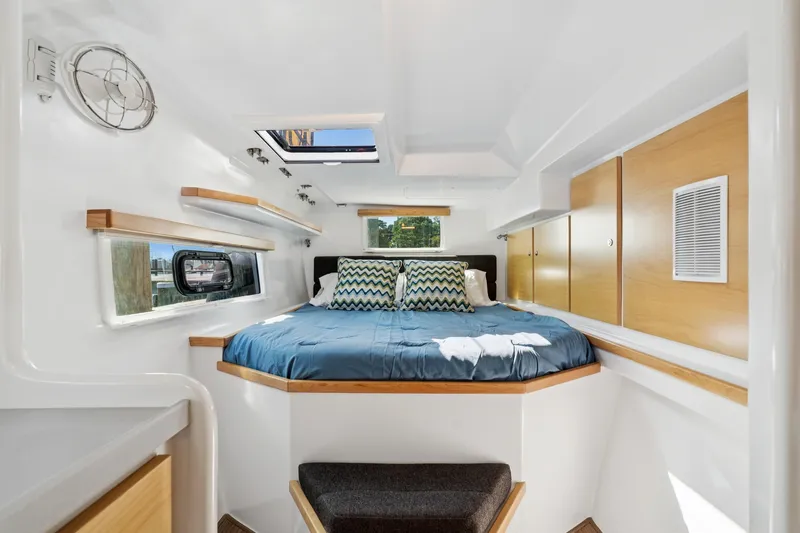 Carolina Red Yacht Photos Pics Luxurious cabin interior of 2024 St Francis 460 yacht with cozy bed and modern design.