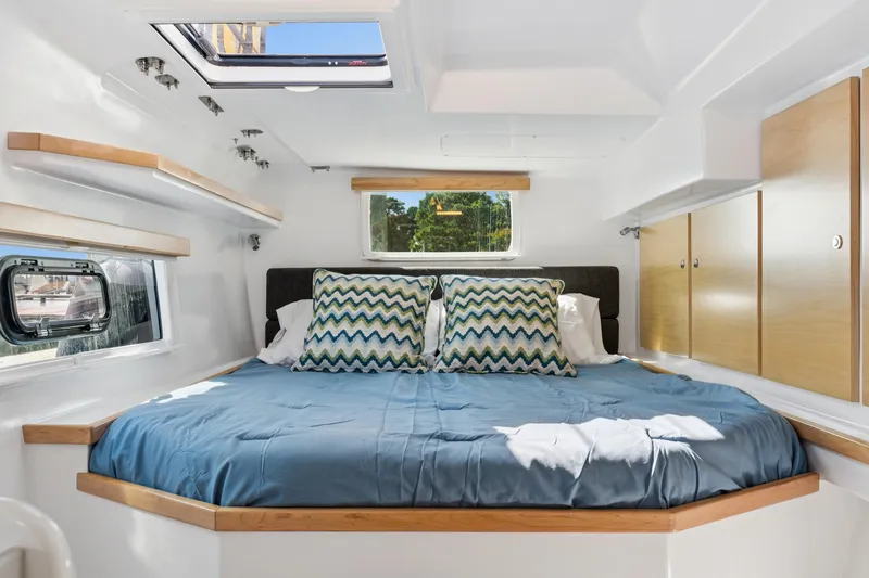 Carolina Red Yacht Photos Pics Luxurious cabin interior of 2024 St Francis 460 yacht with cozy bed and modern design.