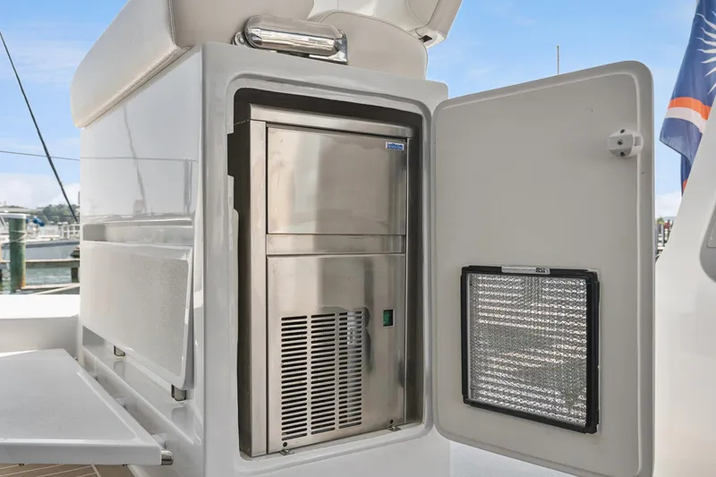 Carolina Red Yacht Photos Pics Open stainless steel compartment on 2024 St Francis 460 yacht, showcasing interior details.