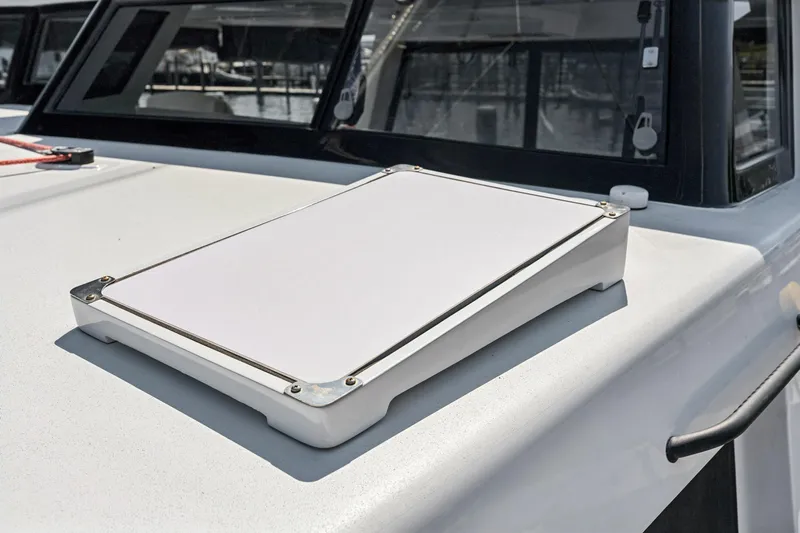 Carolina Red Yacht Photos Pics Rooftop detail of 2024 St Francis 460 boat, featuring a sleek white panel.