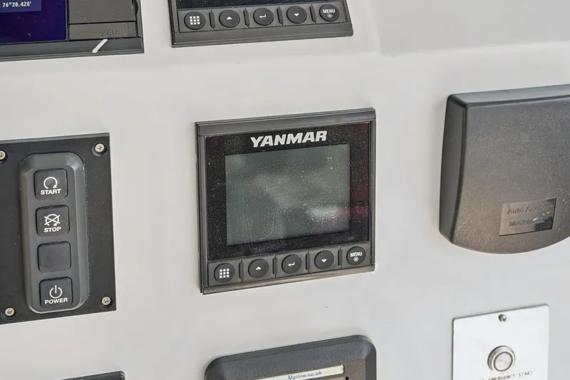 Carolina Red Yacht Photos Pics Control panel of 2024 St Francis 460 yacht featuring Yanmar display and buttons.