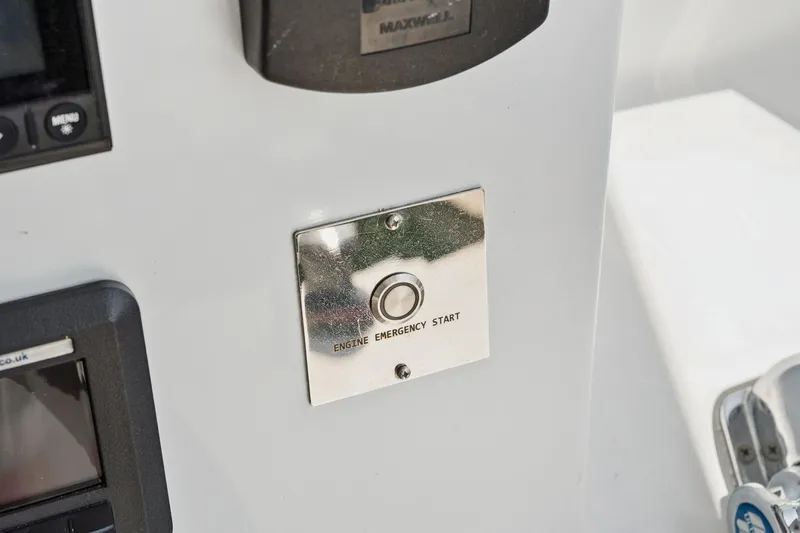 Carolina Red Yacht Photos Pics 2024 St Francis 460 engine emergency start button on control panel.