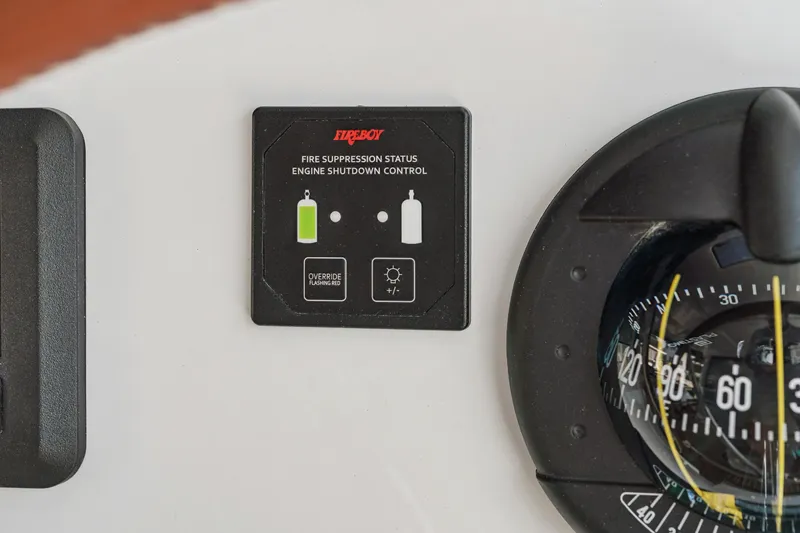 Carolina Red Yacht Photos Pics Fire suppression control panel on 2024 St Francis 460 yacht dashboard.