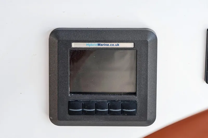 Carolina Red Yacht Photos Pics Control panel on a 2024 St Francis 460 yacht, featuring HybridMarine branding.