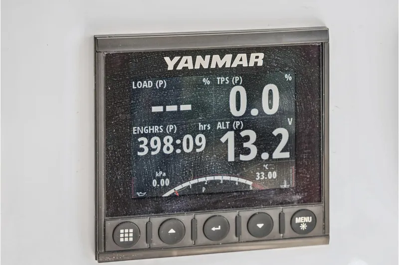 Carolina Red Yacht Photos Pics Yanmar engine display on 2024 St Francis 460, showing load, hours, and voltage.