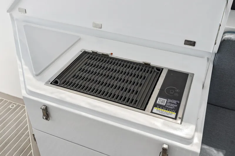 Carolina Red Yacht Photos Pics Built-in grill on 2024 St Francis 460 yacht, featuring Kenyon cooking system.