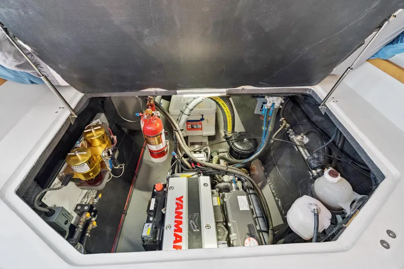 Carolina Red Yacht Photos Pics Engine compartment of 2024 St Francis 460 yacht with Yanmar engine and safety equipment.