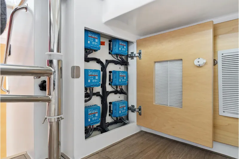 Carolina Red Yacht Photos Pics Electrical panel with blue components inside a St Francis 460, 2024 model yacht.