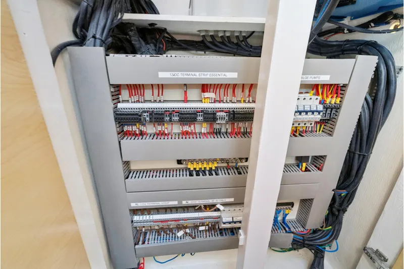 Carolina Red Yacht Photos Pics Electrical panel of 2024 St Francis 460 yacht with organized wiring and labeled components.