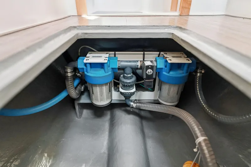 Carolina Red Yacht Photos Pics Water filtration system in 2024 St Francis 460 yacht, featuring blue and gray components.