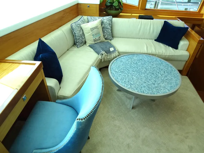 Quintessa Yacht Photos Pics Luxurious 2014 Horizon PC52 yacht interior with elegant seating and stylish decor.
