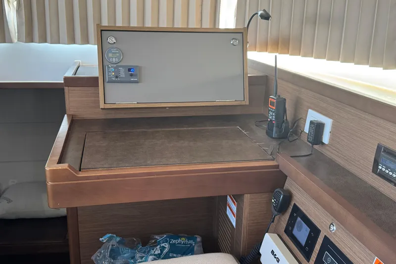 Southern Wild Yacht Photos Pics Interior of 2018 Lagoon 40 yacht with navigation equipment and control panel.