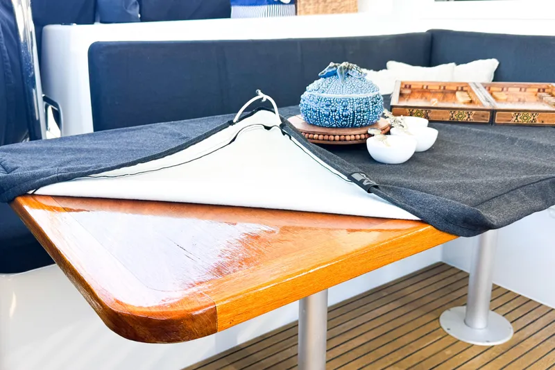 Southern Wild Yacht Photos Pics Cozy interior of 2018 Lagoon 40 yacht with elegant table setting.
