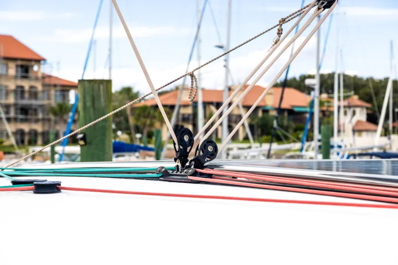 Southern Wild Yacht Photos Pics Rope rigging on a 2018 Lagoon 40 catamaran in a marina setting.