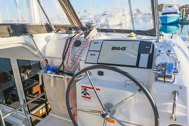 Southern Wild Yacht Photos Pics Cockpit of 2018 Lagoon 40 catamaran with B&G navigation system and steering wheel.