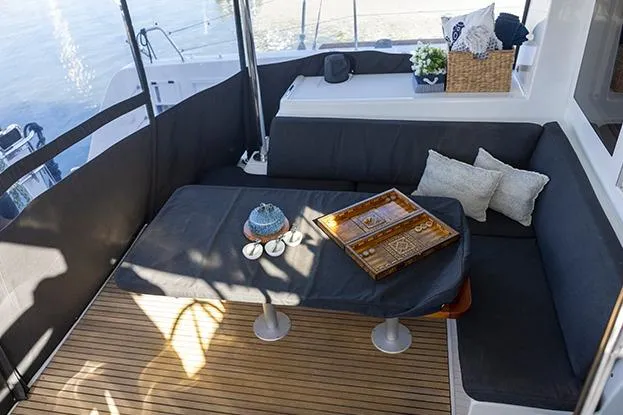 Southern Wild Yacht Photos Pics 2018 Lagoon 40 yacht interior with cozy seating and elegant decor.