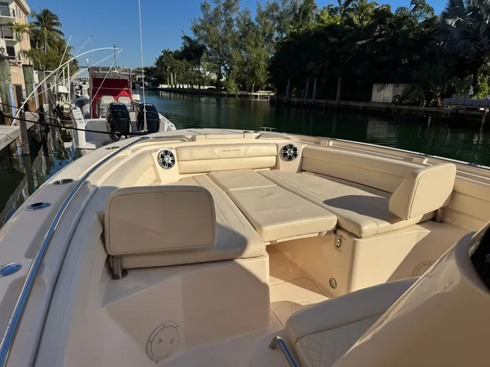 Bugs And Brew Yacht Photos Pics 2024 Grady-White 326 CAN boat with luxurious seating area.