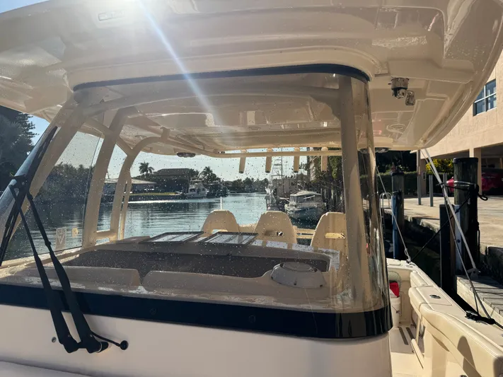 Bugs And Brew Yacht Photos Pics 2024 Grady-White 326 CAN boat at sunny dock.