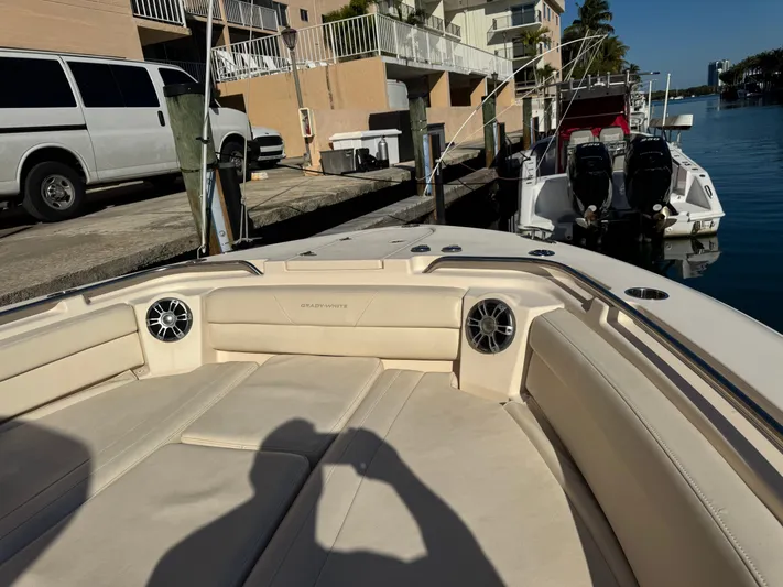 Bugs And Brew Yacht Photos Pics Grady-White 326 CAN 2024 boat docked with speakers.