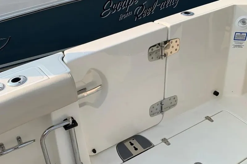  Yacht Photos Pics 2019 Boston Whaler 380 Outrage boat deck with stainless steel fittings and safety features.