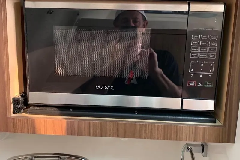  Yacht Photos Pics Microwave oven inside 2019 Boston Whaler 380 Outrage boat kitchen area.