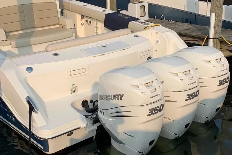  Yacht Photos Pics 2019 Boston Whaler 380 Outrage with triple Mercury 350 Verado engines docked.