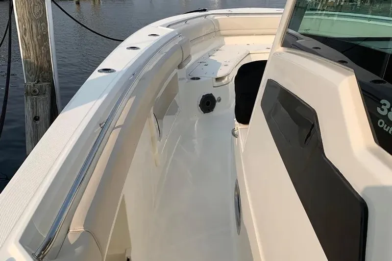  Yacht Photos Pics 2019 Boston Whaler 380 Outrage boat deck, showcasing sleek design and spacious layout.