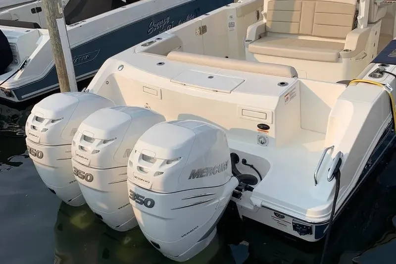  Yacht Photos Pics 2019 Boston Whaler 380 Outrage with triple Mercury 350 engines docked.