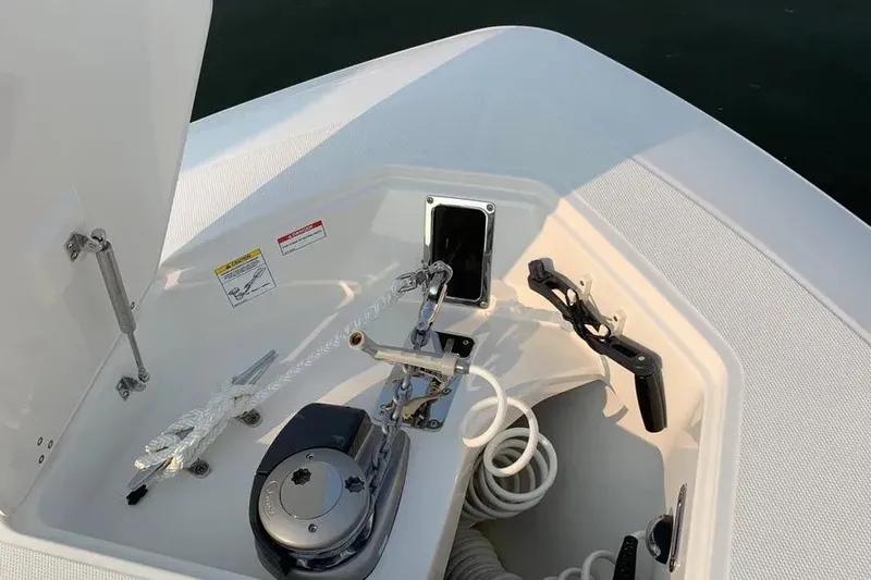  Yacht Photos Pics 2019 Boston Whaler 380 Outrage anchor compartment with rope and winch system.