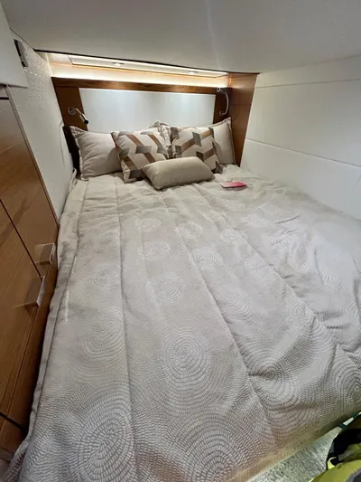  Yacht Photos Pics 2022 Tiara Yachts C39 Coupe cabin with cozy bed and modern decor.