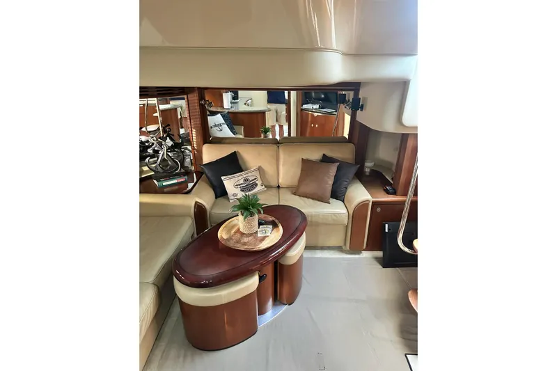  Yacht Photos Pics Luxurious interior of 2006 Sea Ray 52 Sundancer yacht with elegant seating and decor.