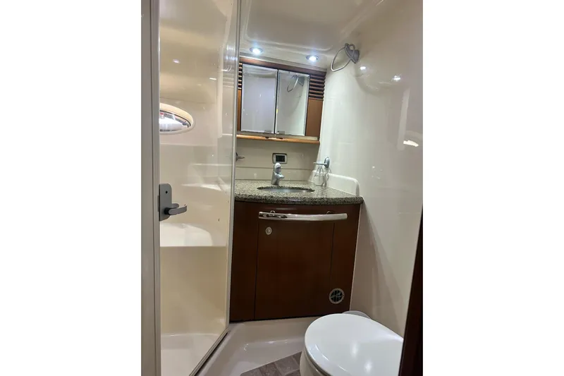  Yacht Photos Pics Luxurious bathroom in 2006 Sea Ray 52 Sundancer yacht with modern fixtures.