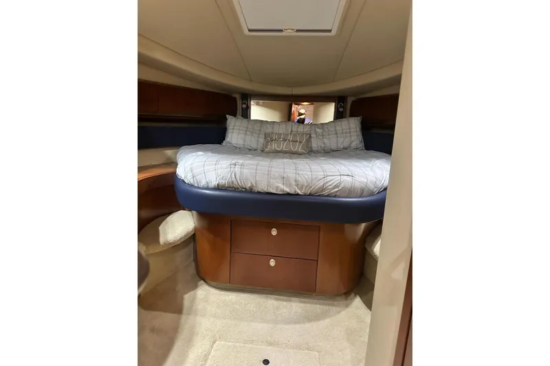  Yacht Photos Pics Luxurious cabin interior of 2006 Sea Ray 52 Sundancer yacht with cozy bed.