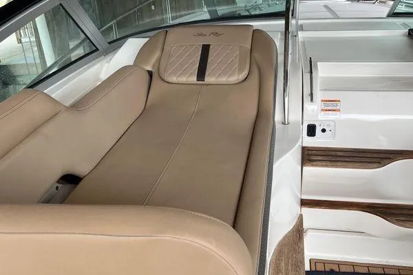  Yacht Photos Pics 2017 Sea Ray Sundancer 350 interior with beige seating and wooden accents.