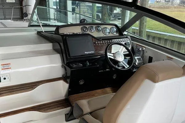  Yacht Photos Pics 2017 Sea Ray Sundancer 350 helm with Raymarine navigation system and modern controls.