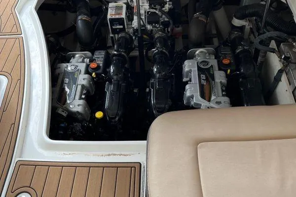  Yacht Photos Pics Engine compartment of a 2017 Sea Ray Sundancer 350 boat, showcasing dual engines.