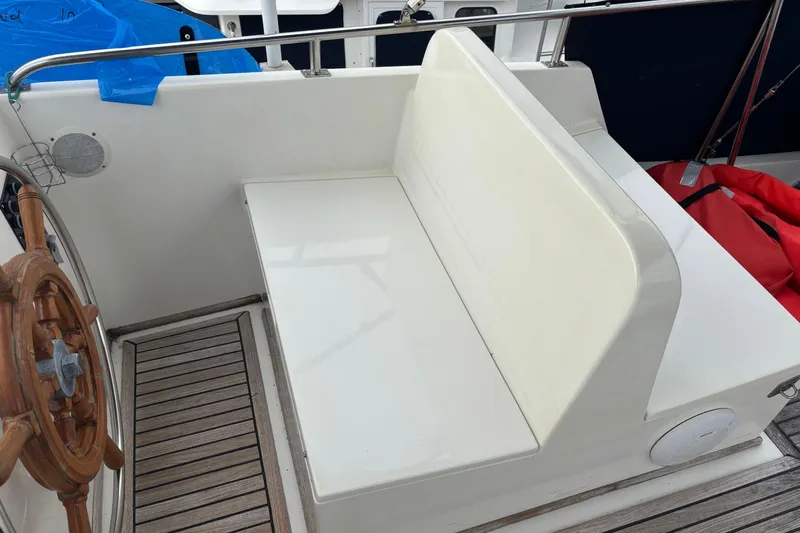  Yacht Photos Pics Wooden helm and seating area on 1991 Grand Banks 36 Classic yacht.