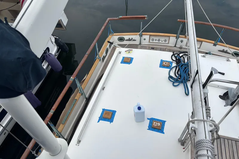  Yacht Photos Pics Deck of a 1991 Grand Banks 36 Classic yacht with ropes and maintenance items.