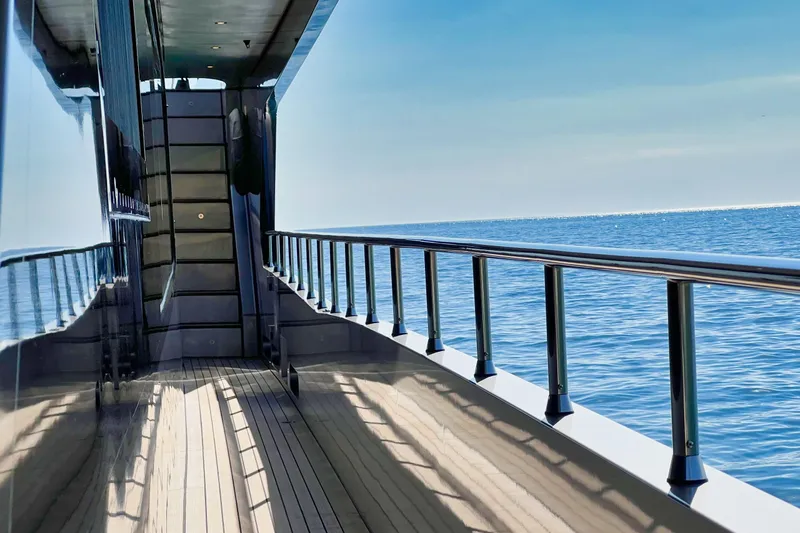 Smooth Operator Yacht Photos Pics Side deck of a 2011 Jongert 39m yacht with ocean view.